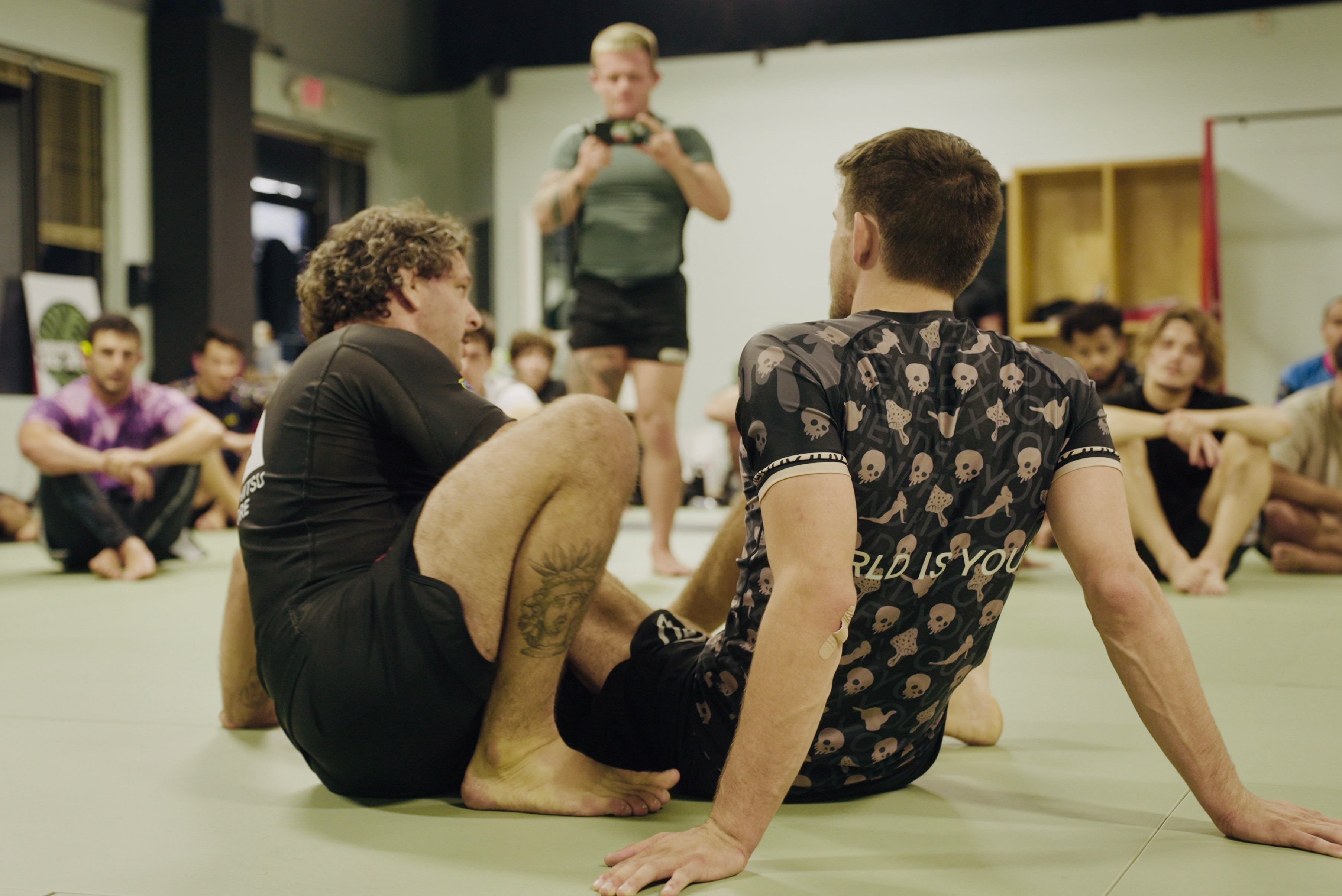 Students drilling BJJ techniques at Austin No-Gi Jiu Jitsu academy